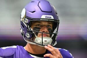 Tyler Forness predicts JJ McCarthy will achieve a 2.5:1 TD-INT ratio in 2025, a bold mark for a second-year QB. His quick decisions, mobility, and O’Connell’s run-heavy scheme ease pressure, setting him up to shine. “He’s way more willing to take the yards and go.”